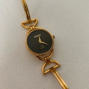 *SOLD Gucci Black and Gold Tone Watch, Model 6200L